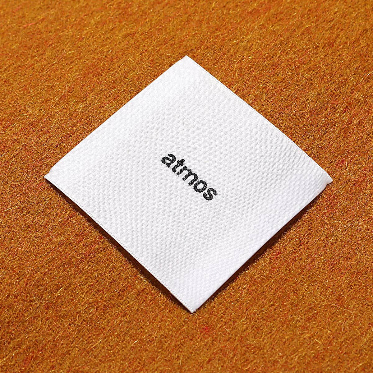 atmos pink カシミヤ ブレンド ストール  MUSTARDの画像