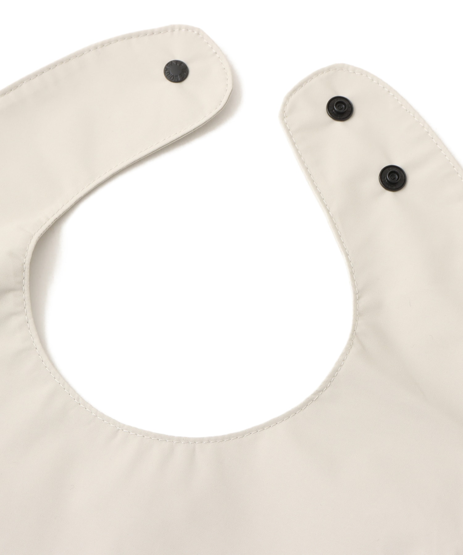 THE NORTH FACE Baby Compact Yummy Bib フォッシルアイボリーの画像