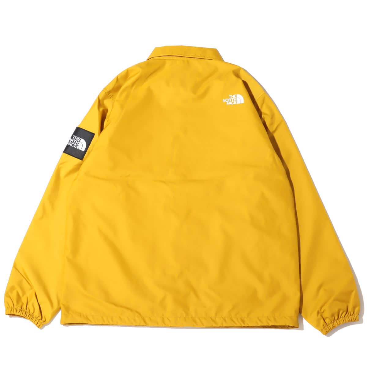 THE NORTH FACE ナイロンコーチジャケット　イエロー