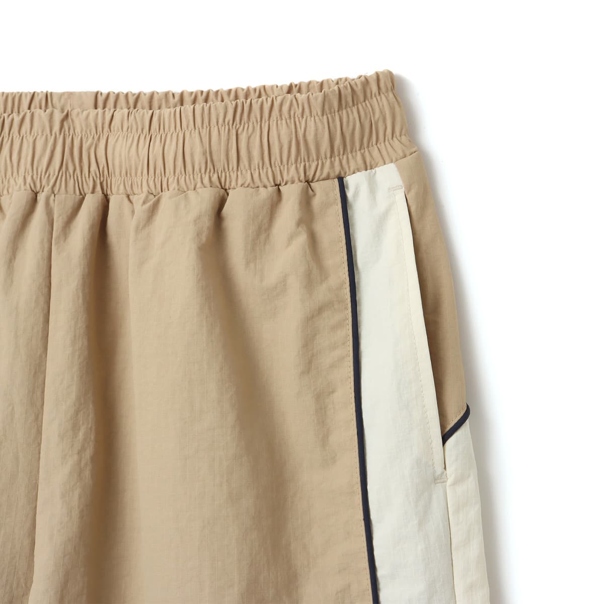 UMBRO × atmos pink Track Pants BEIGEの画像