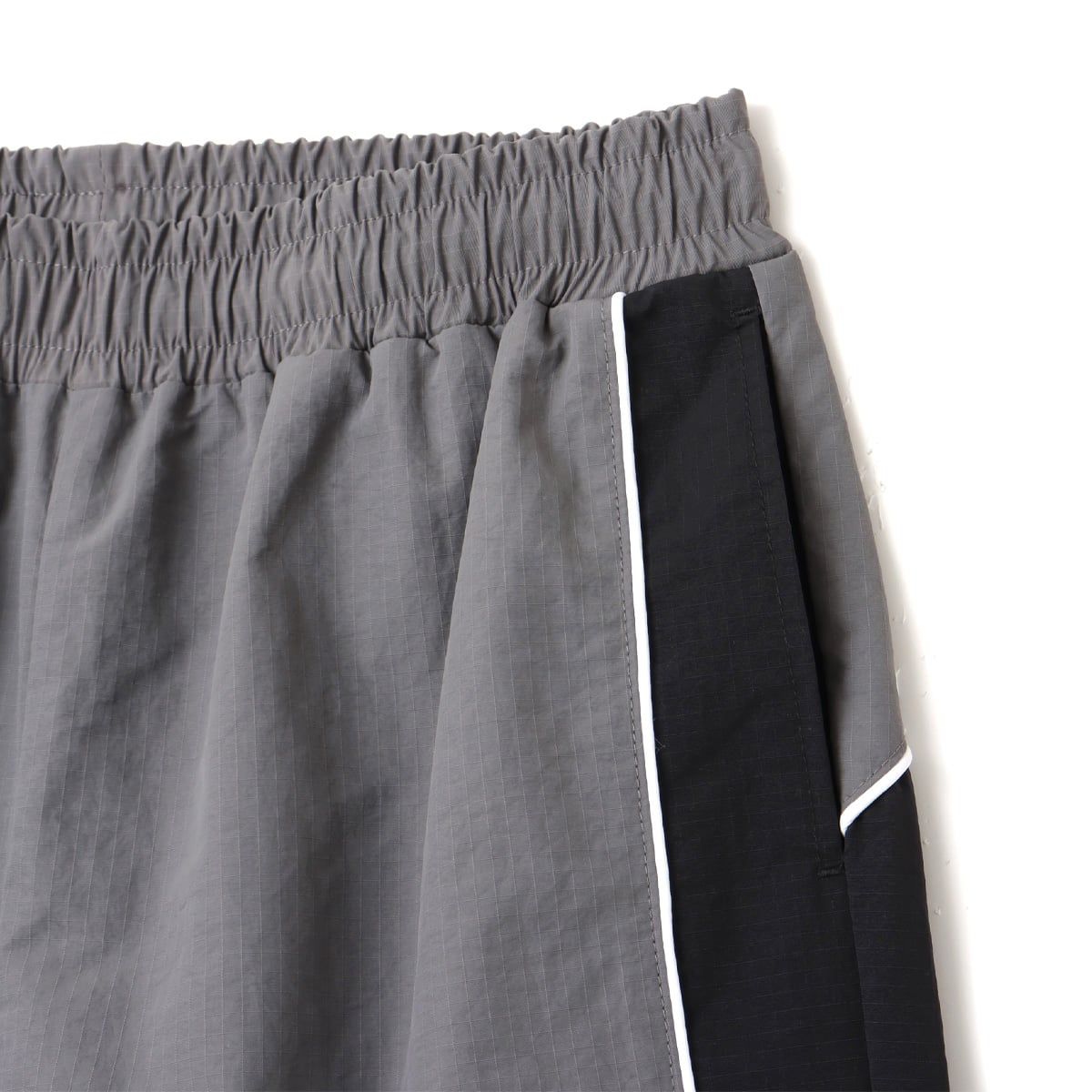 UMBRO × atmos pink Track Pants BLACKの画像