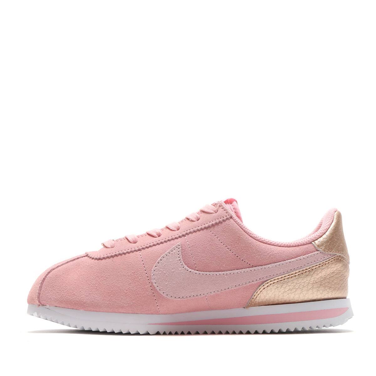 pink and red nike cortez