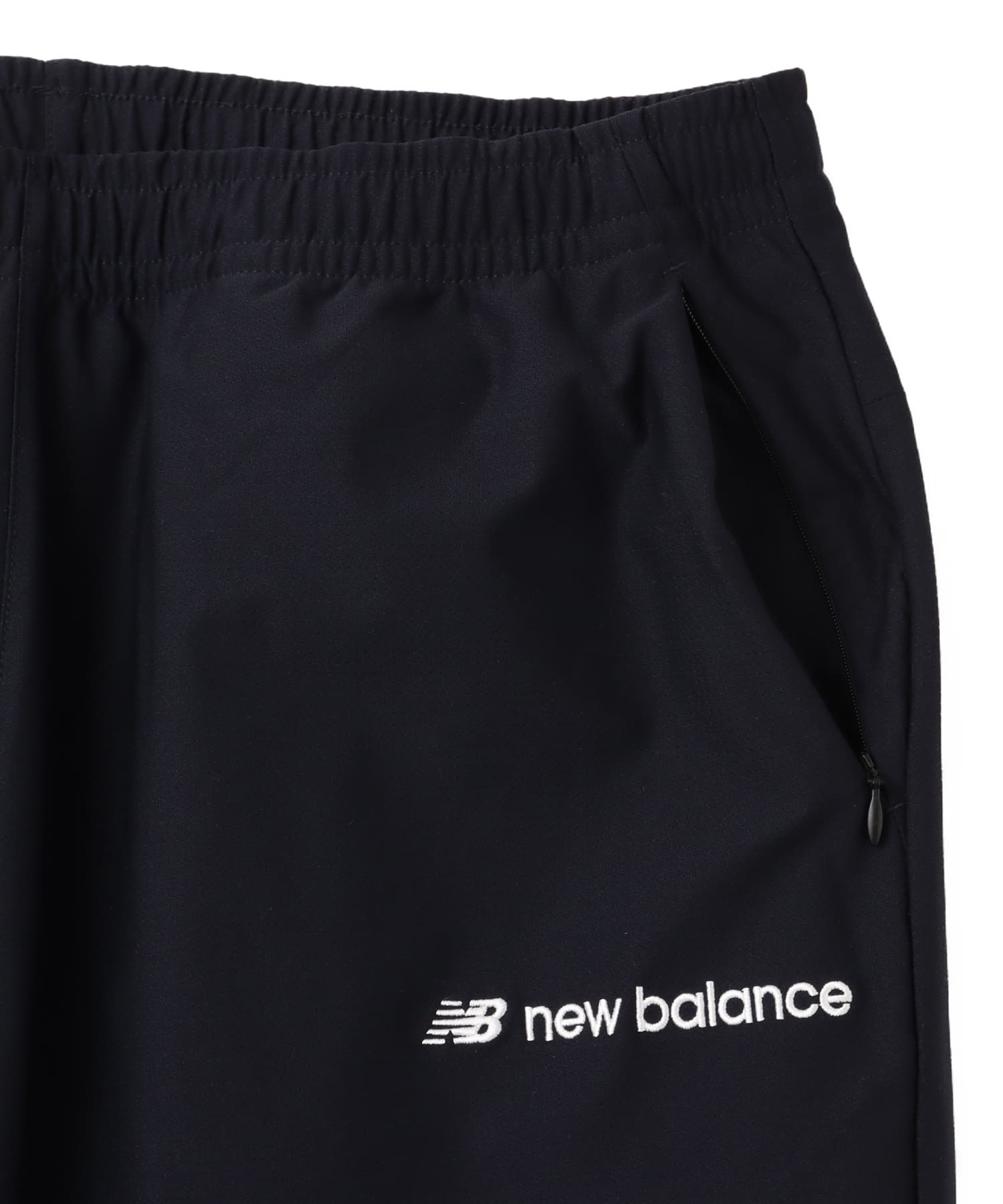 New Balance MET24 Track Pants ネイビーの画像