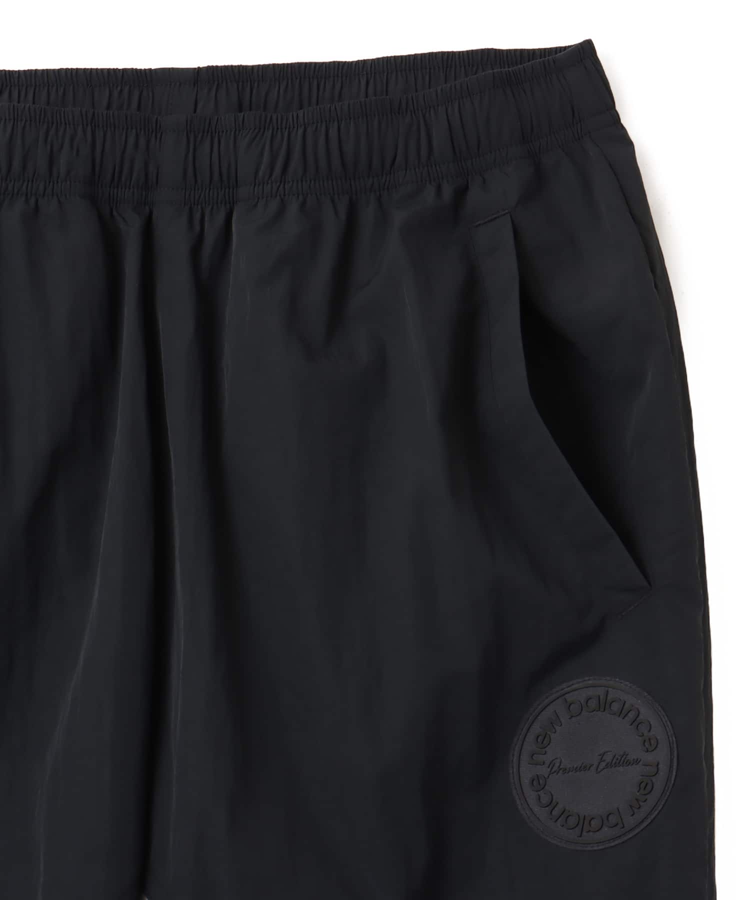 New Balance WIND PANTS ブラック/グレーの画像