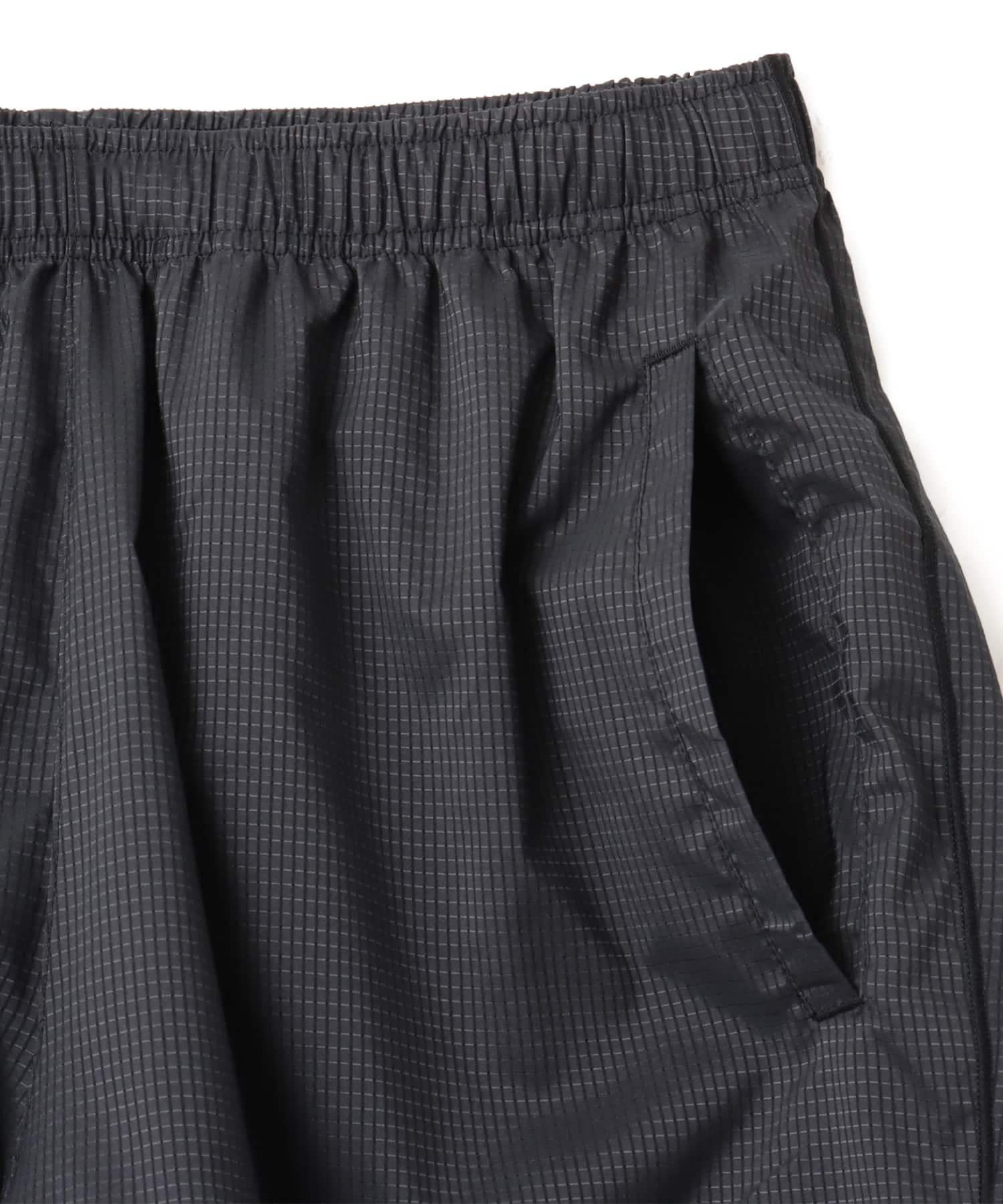 New Balance MESH STRECH WOVEN SHORTS ブラックの画像