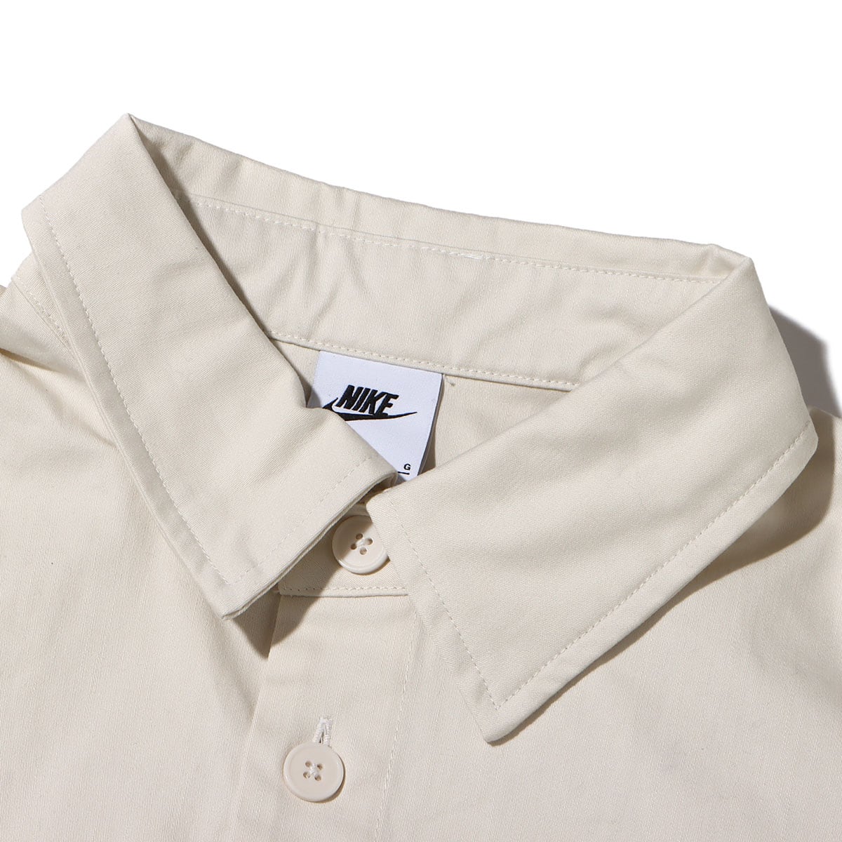 NIKE AS M NL WVN MLTY SS BTN SHIRT PHANTOM/BLACK 23FA-Iの画像
