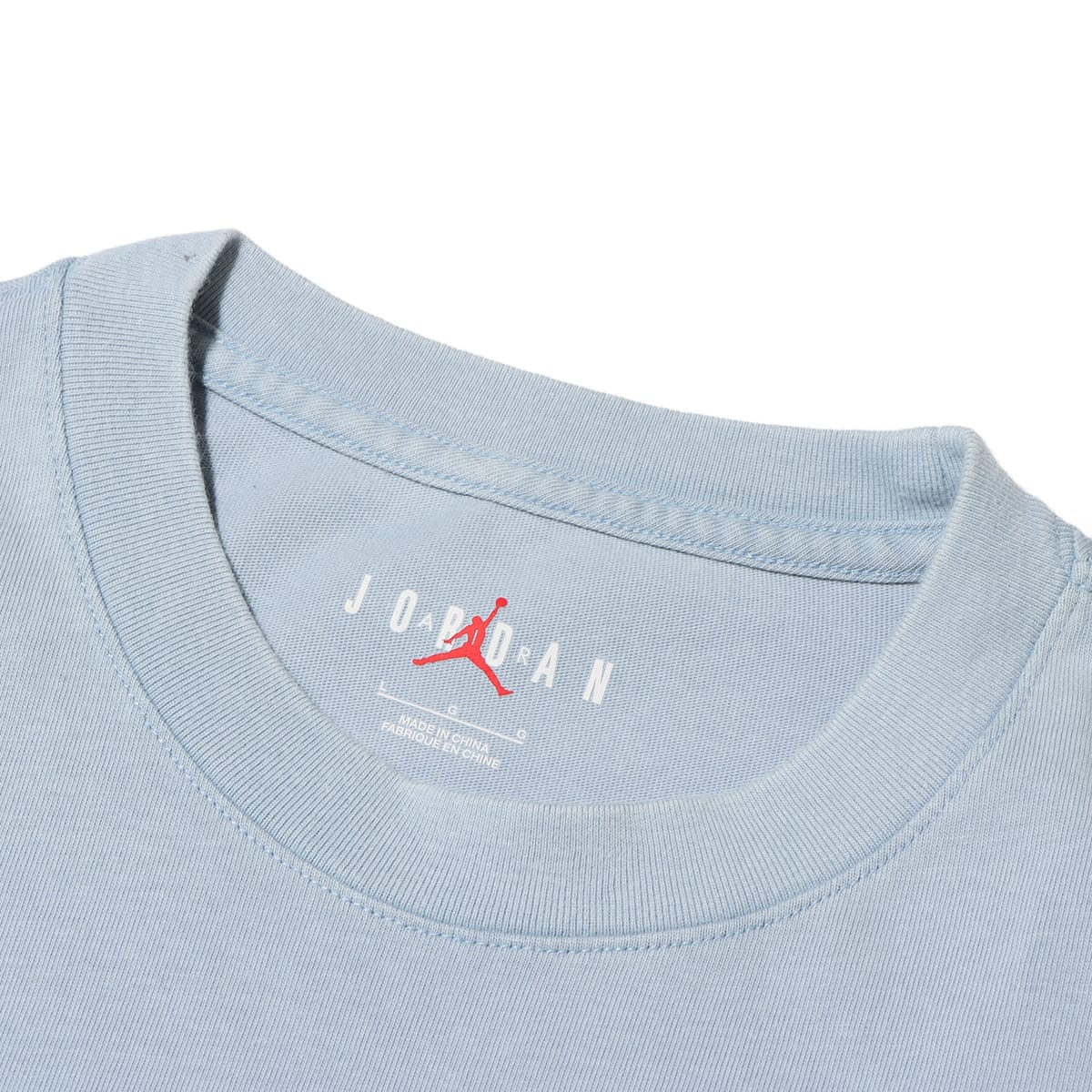 JORDAN BRAND AS M J FLT ESS WSH OVSZ SS CRW BLUE GREYの画像