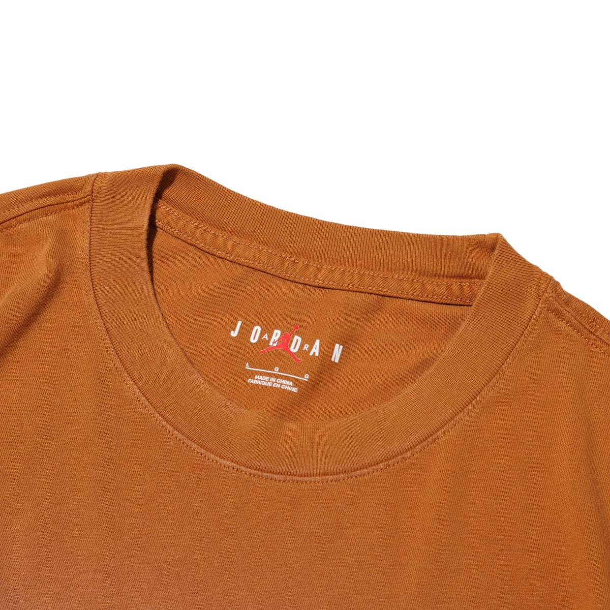 JORDAN BRAND M J FLT ESS WSH 85 SS CRW DESERT BRONZE の画像