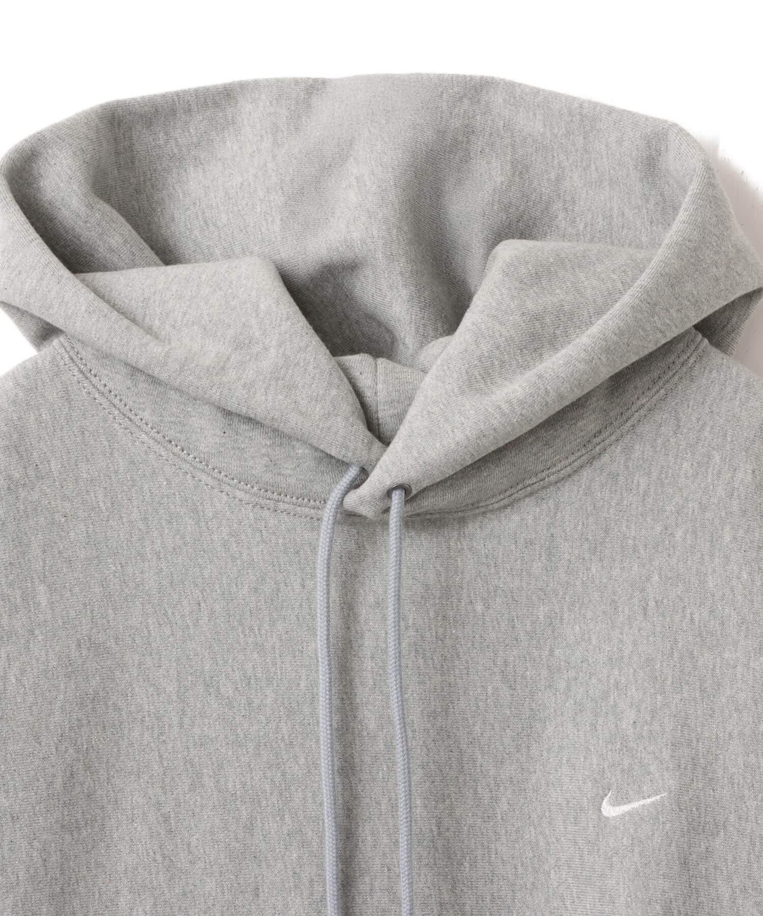 NIKE AS M NL SOLO SWSH BB PO HOODIE DK GREY HEATHER/LT SMOKE GREY/WHITEの画像