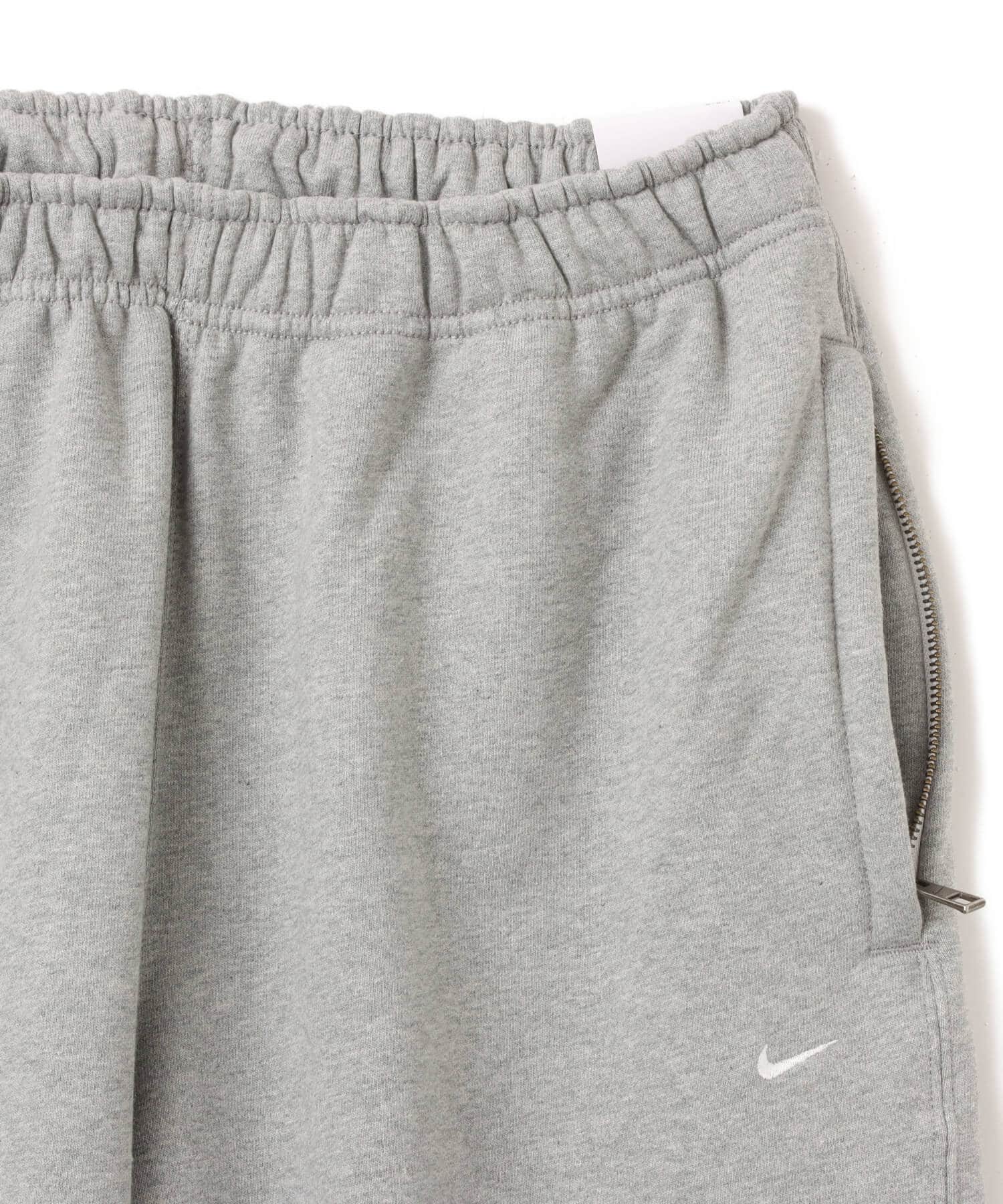 NIKE AS M NL SOLO SWSH BB CF PANT DK GREY HEATHER/LT SMOKE GREY/WHITEの画像