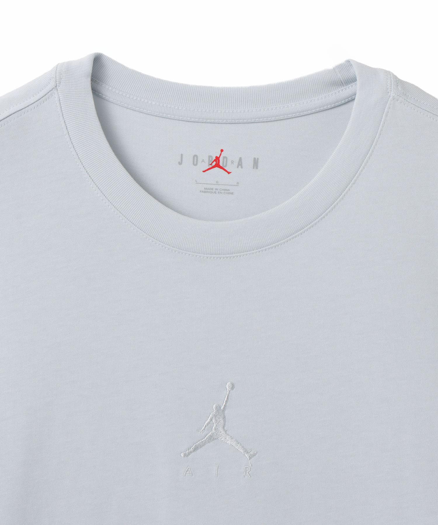 JORDAN BRAND M J FLT ESS OVSZ SS CREW LIGHTBLUEの画像