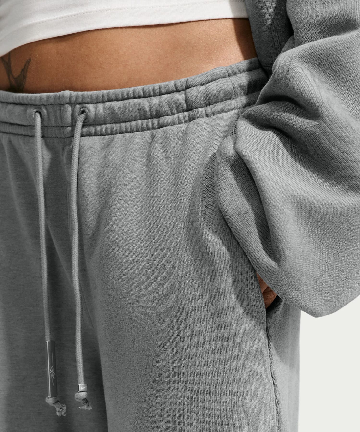 NIKE W NRG NK STUDIO FLEECE PANT COOL GREY HTRの画像