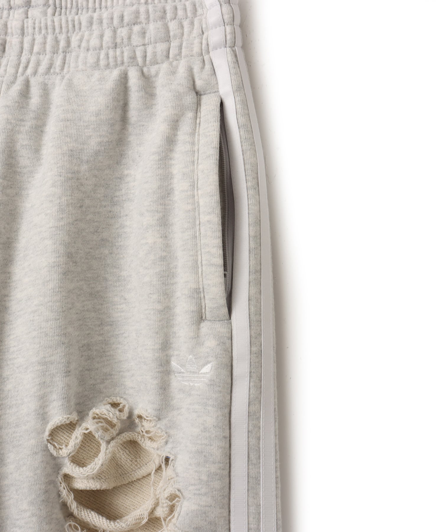 adidas DISTRESSED JOGGERS ライトグレーヘザーの画像
