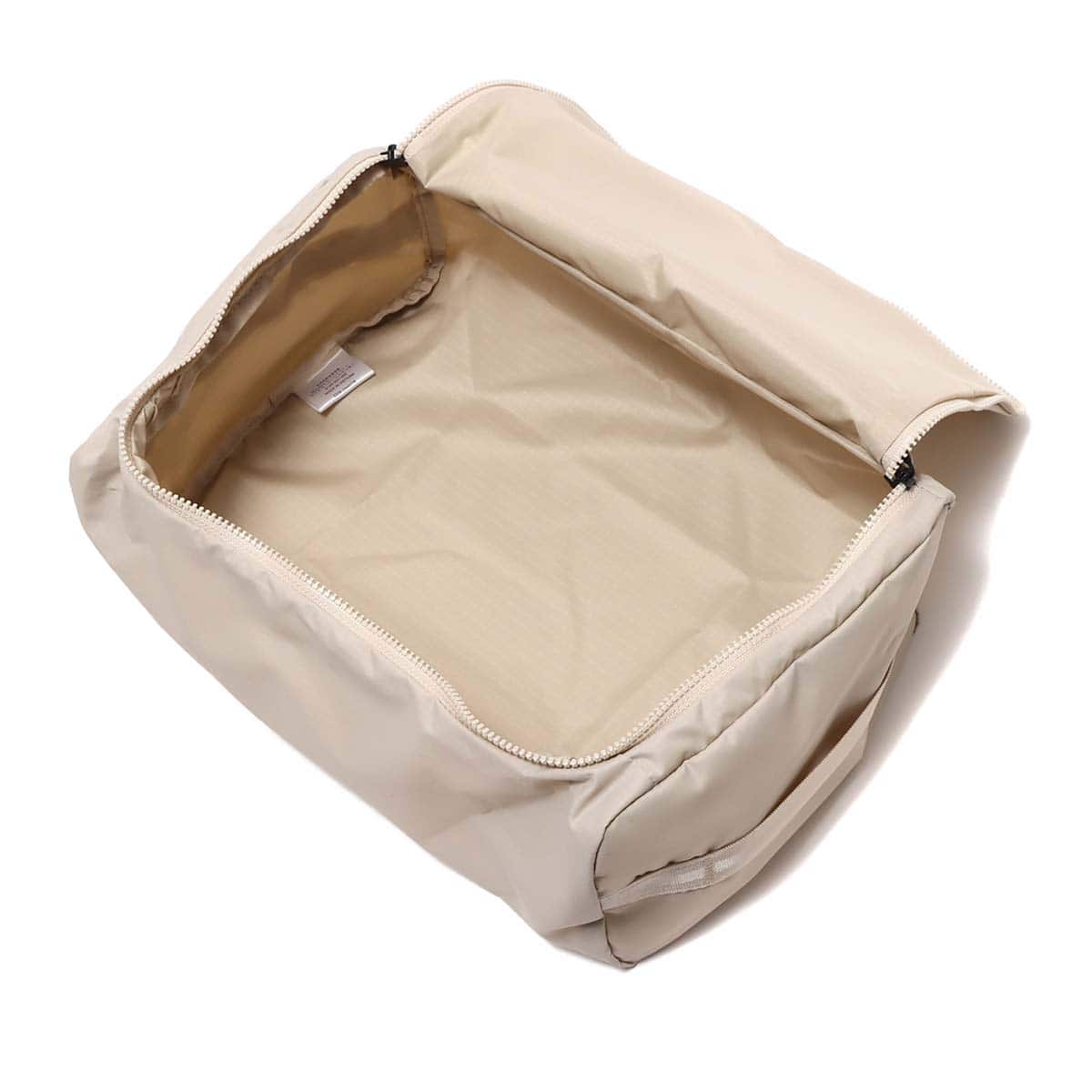 THE NORTH FACE GLAM TRAVEL BOX S フォッシルアイボリー 23SS-Iの画像