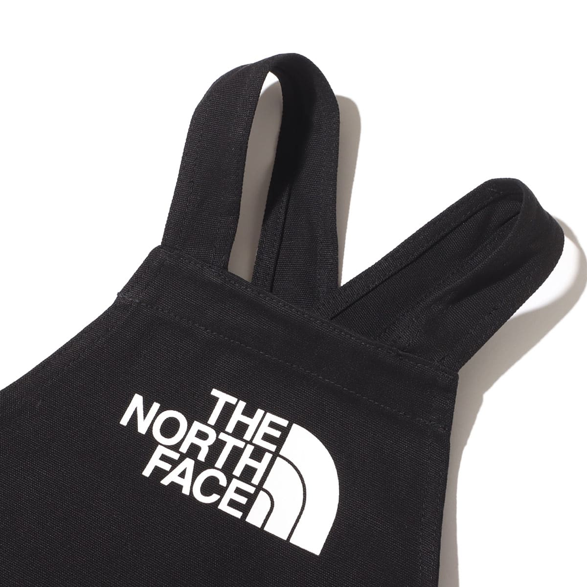 THE NORTH FACE TNF LOGO APRON BLACK 23FW-I