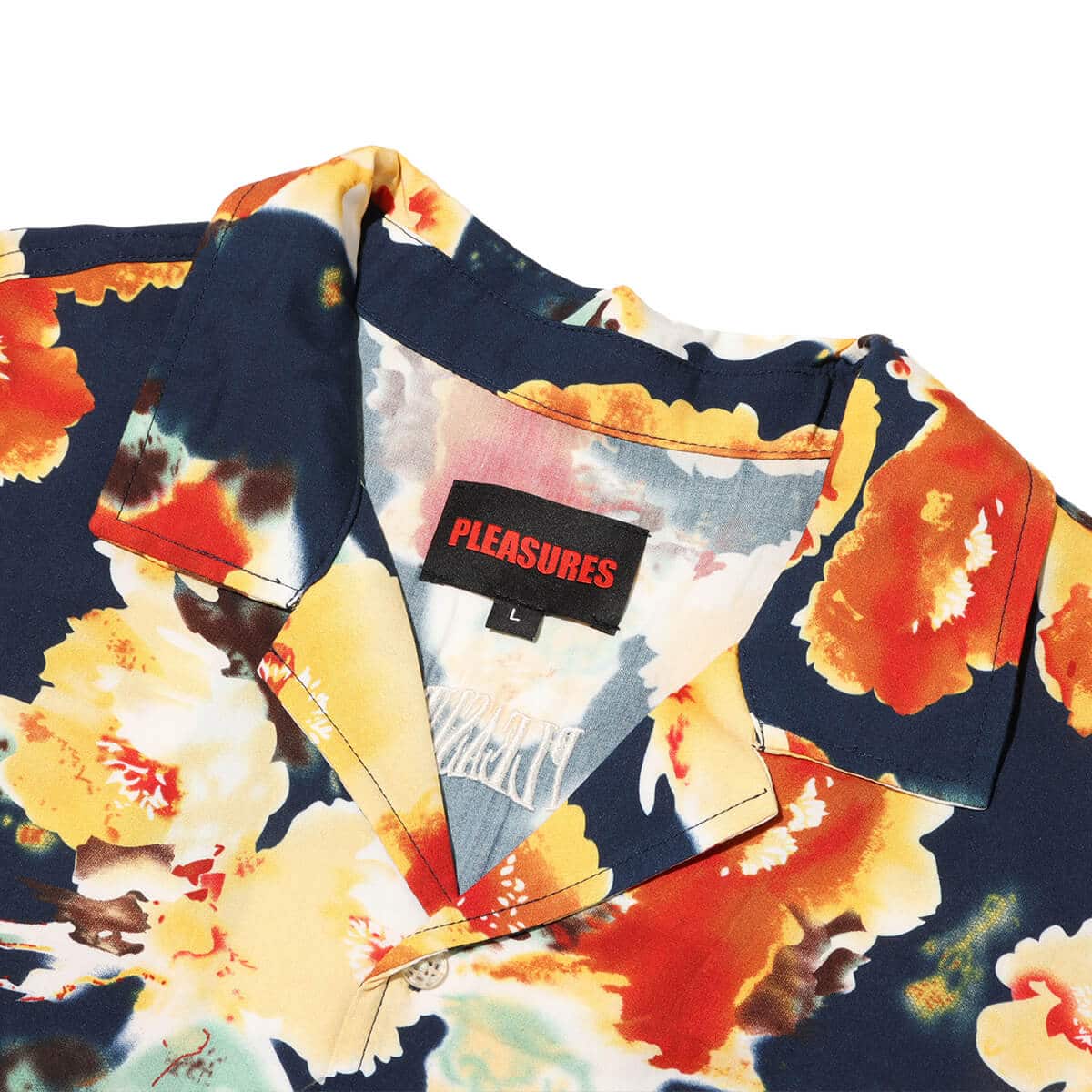 PLEASURES PORTION BUTTON DOWN NAVYの画像