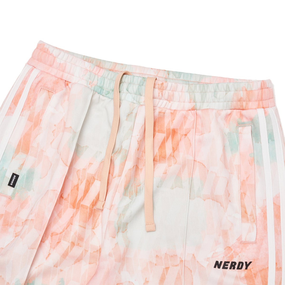 NERDY × ATMOS DNA Watercolor Brush Track Pants ORANGEの画像