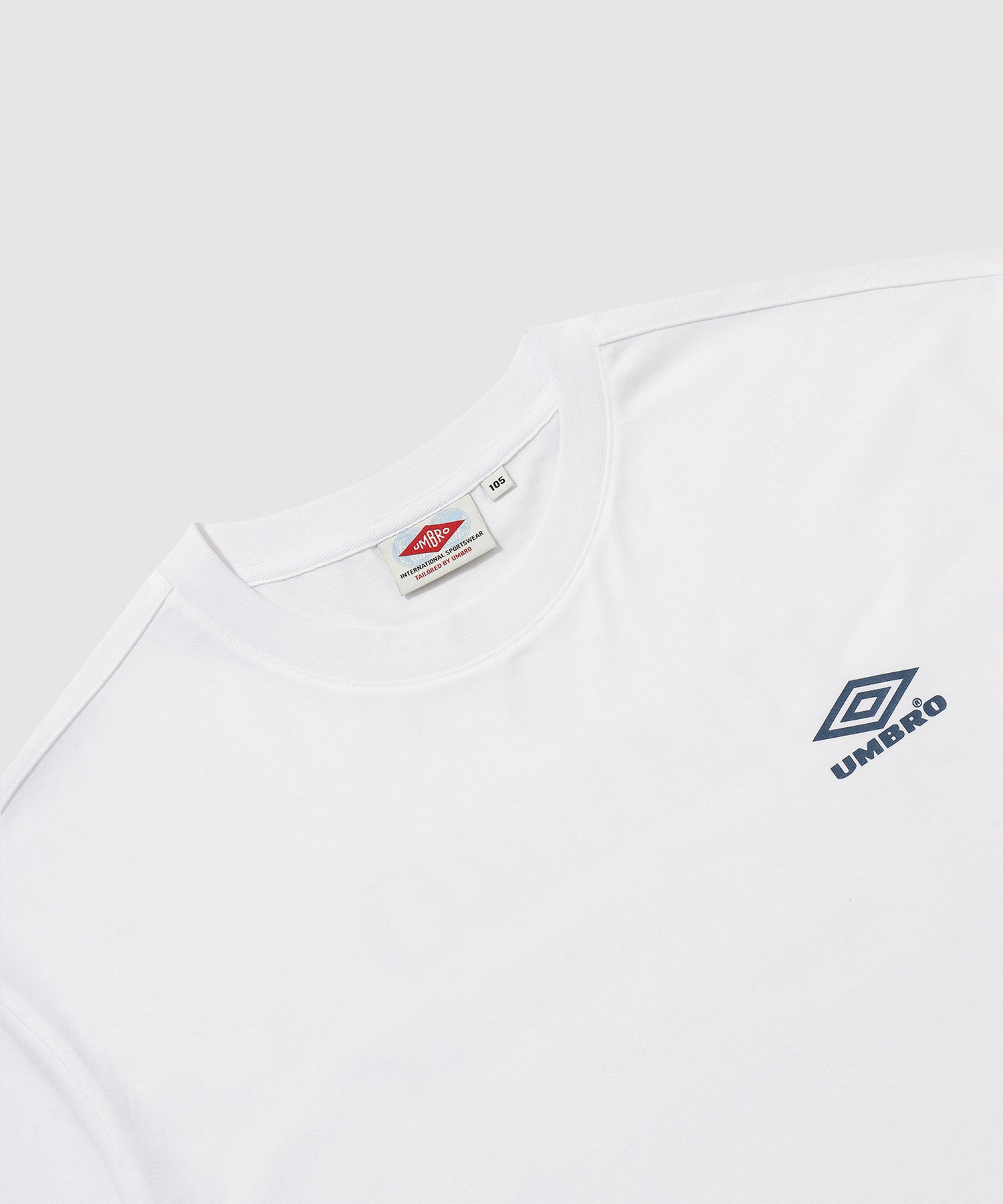 UMBRO 【KOREA COLLECTION】HBL CASUAL ARCHIVE ARTWORK SHORTS SLEEVE T-SHIRTS ホワイトの画像