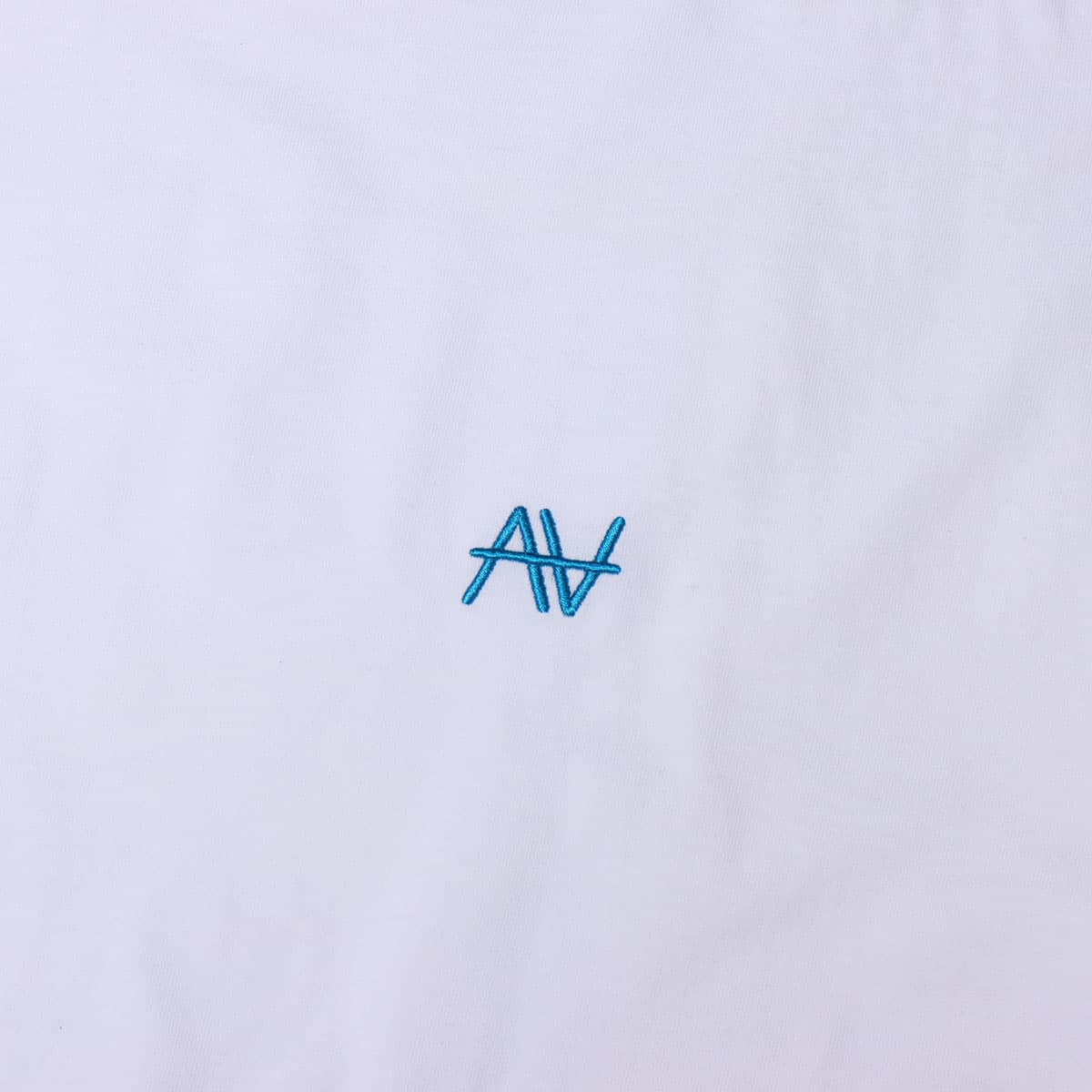 acane × atmos pink オリジナル グラフィック TEE WHITEの画像