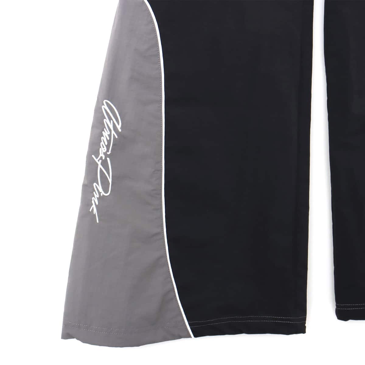 UMBRO × atmos pink Track Pants BLACKの画像