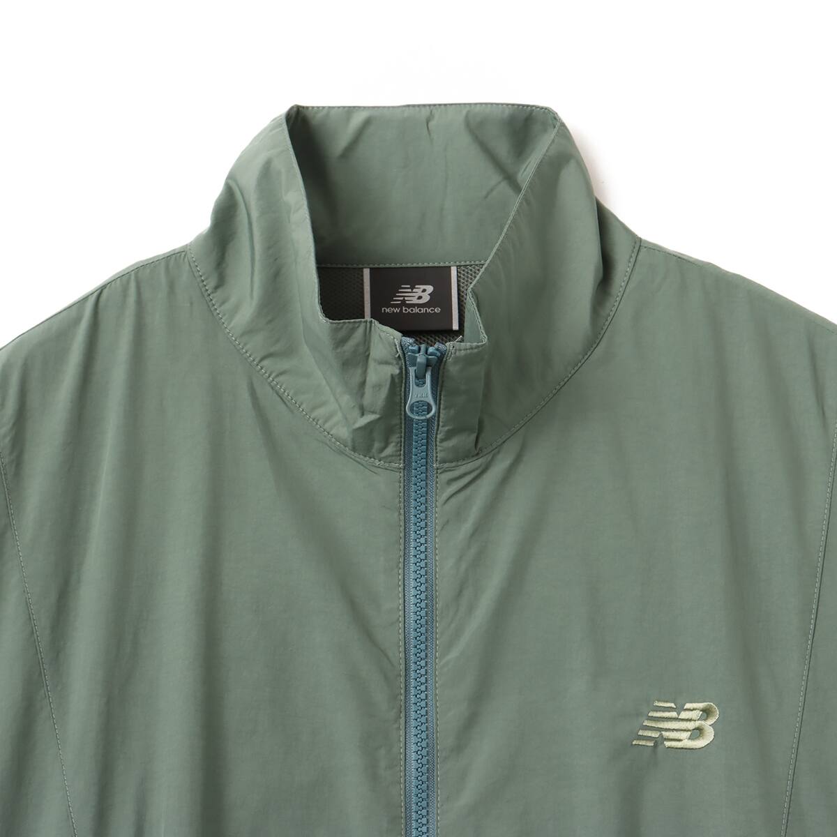 New Balance MET24 Varsity Jacket ダークジュ二パーの画像