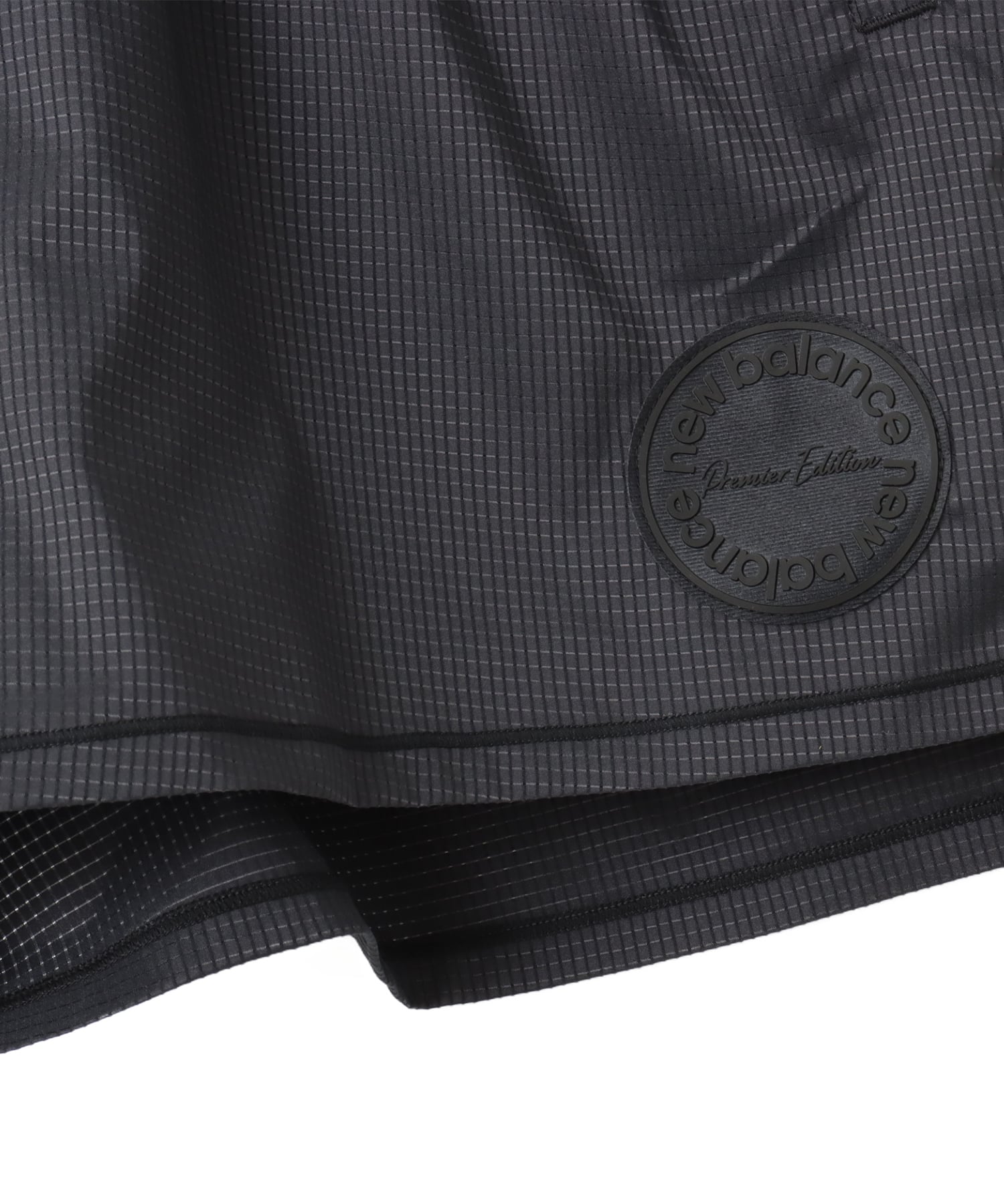 New Balance MESH STRECH WOVEN SHORTS ブラックの画像