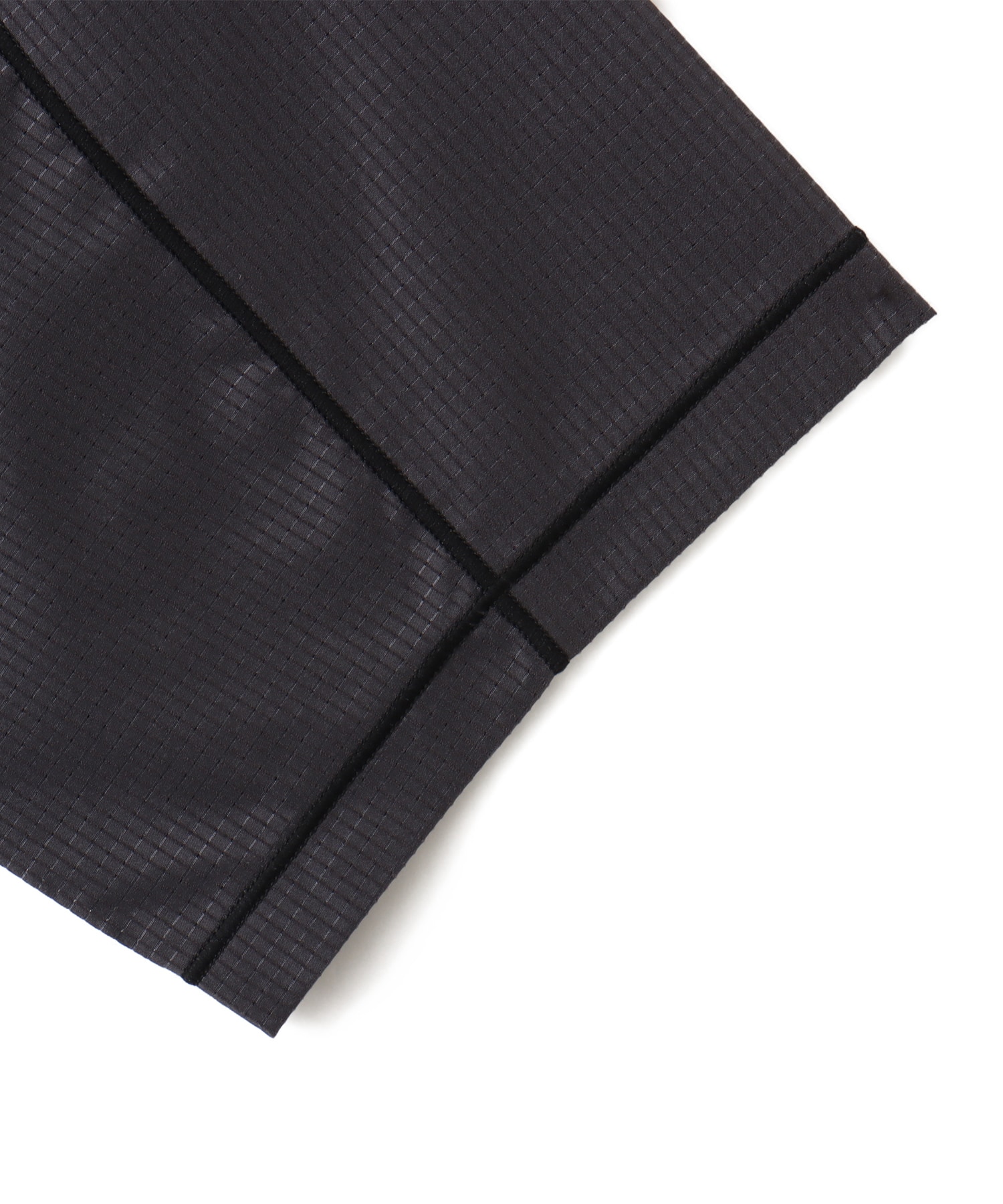 New Balance MESH STRECH WOVEN SHORT SLEEVE SHIRTS チャコールグレーの画像