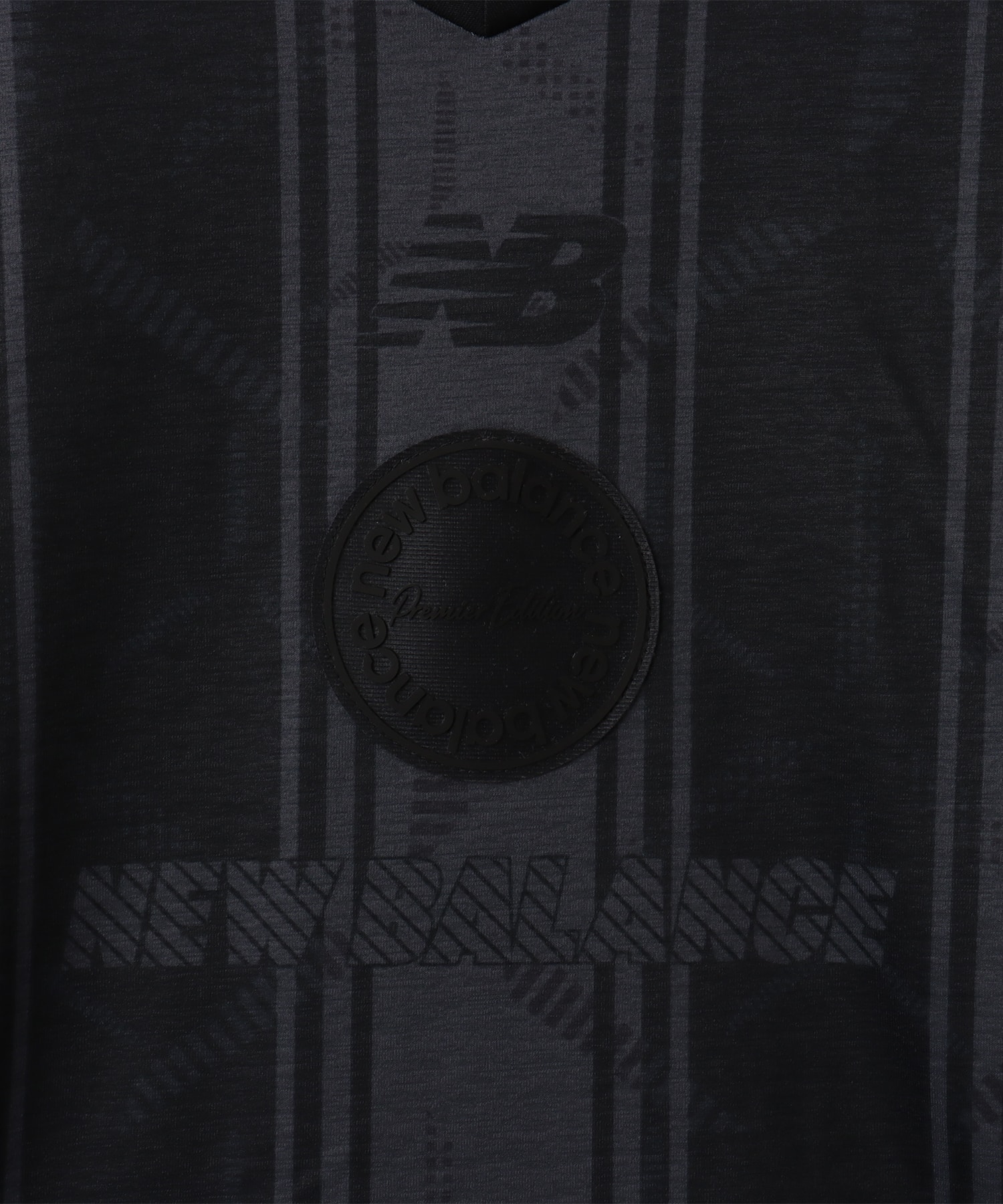 New Balance GRAPHIC POLO LONG SLEEVE SHIRTS ブラックの画像