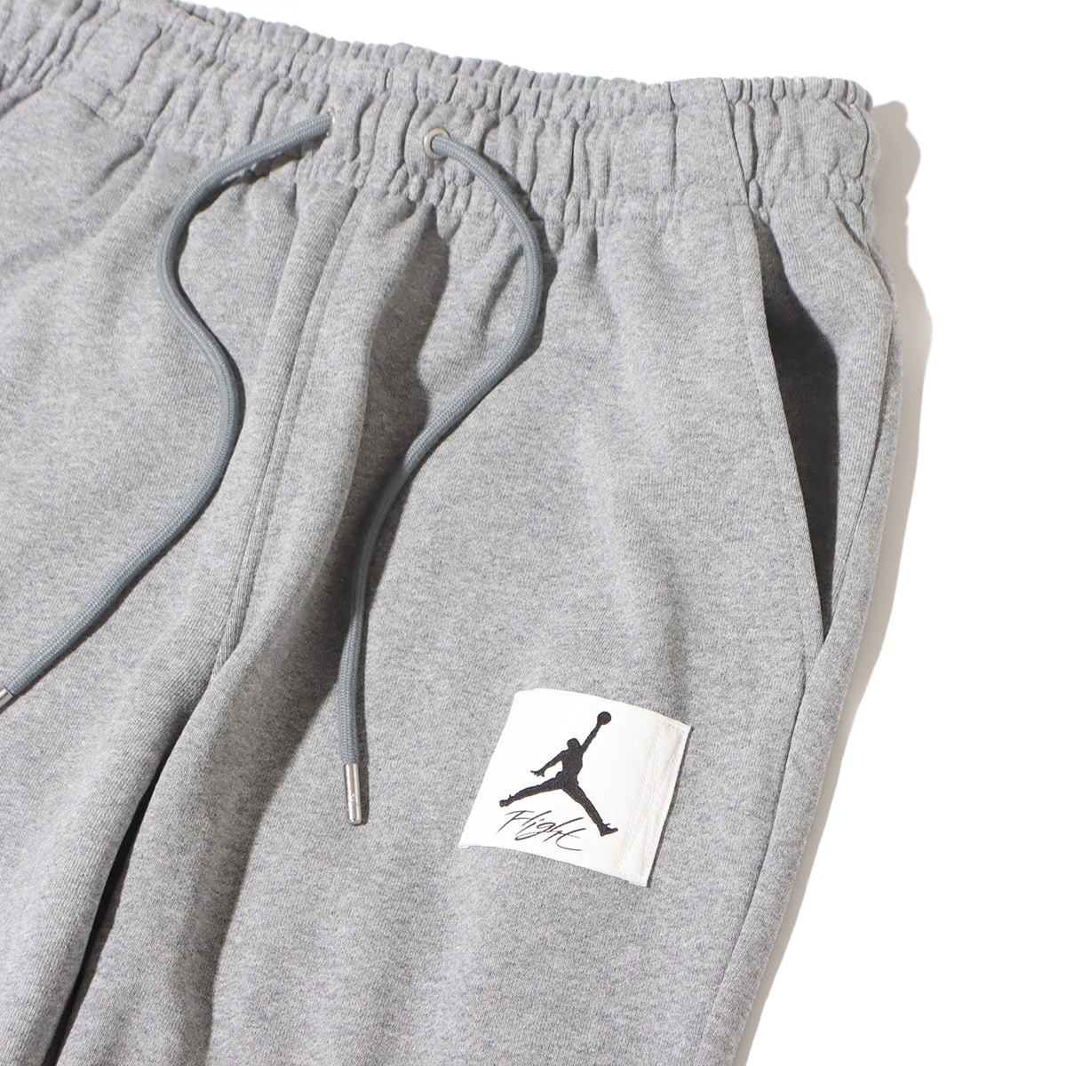 JORDAN BRAND AS M J ESS STMT FLC PANT CARBON HEATHER/SAILの画像