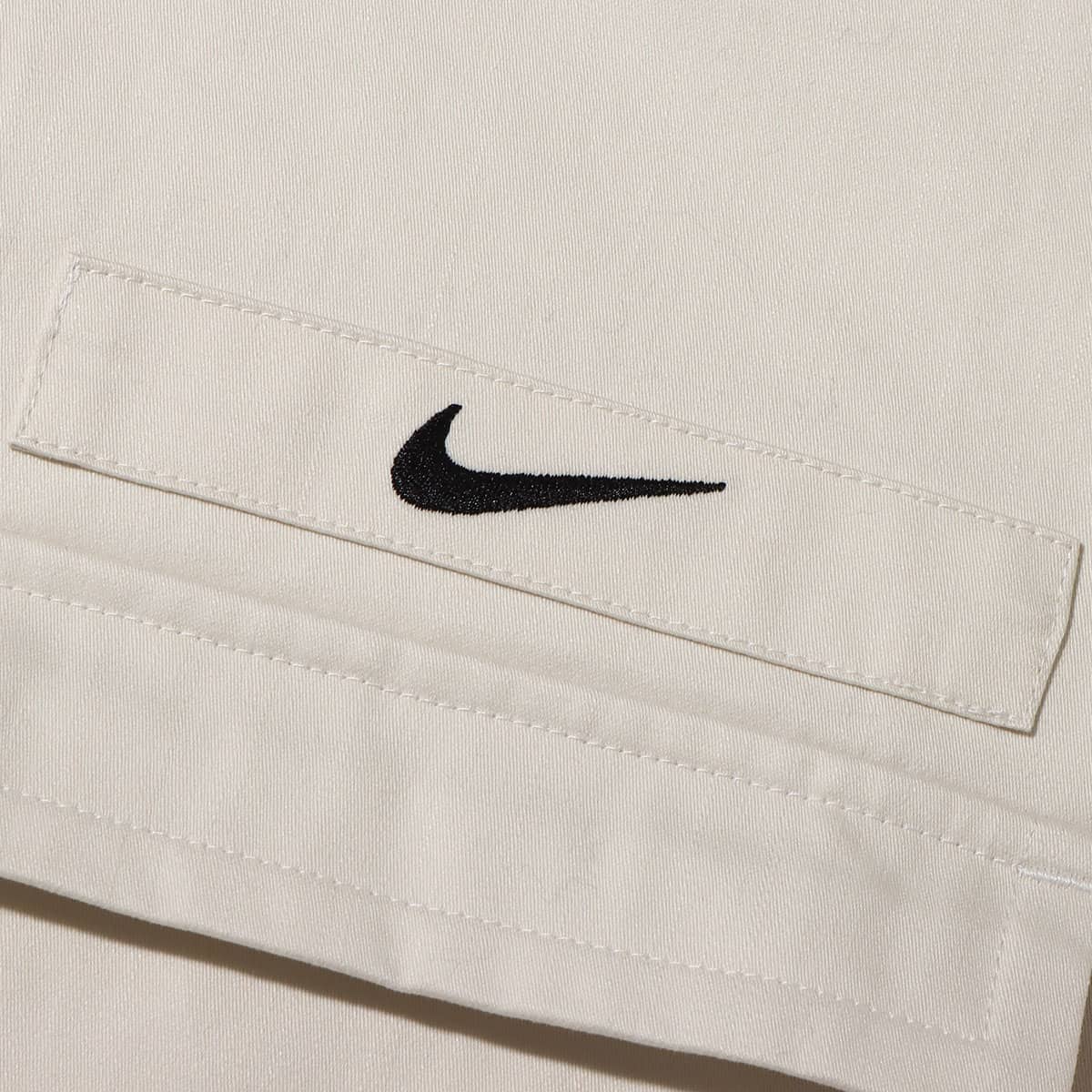 NIKE AS M NL WVN MLTY SS BTN SHIRT PHANTOM/BLACK 23FA-Iの画像