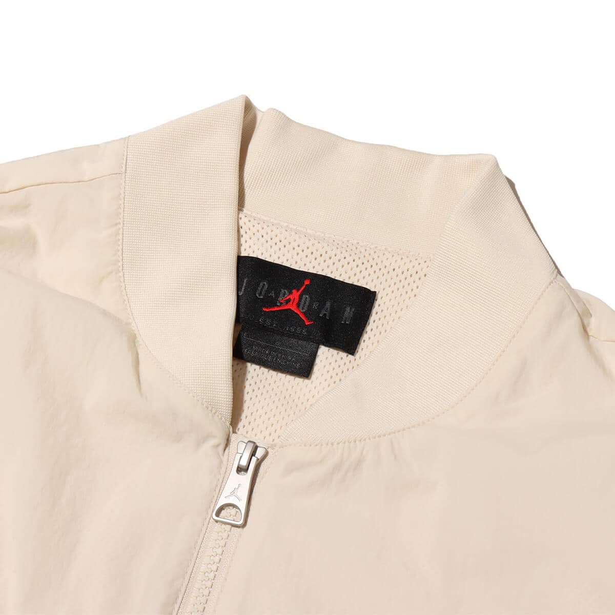 JORDAN BRAND AS M J ESS STMT LTWT RNGD JKT LEGEND LT BROWN の画像