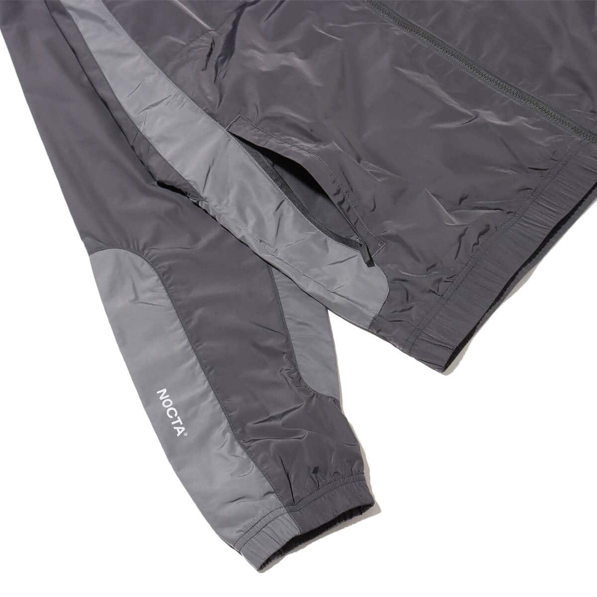 NIKE M NRG NOCTA CS TRK JKT WVN ANTHRACITE/IRON GREY/WOLF