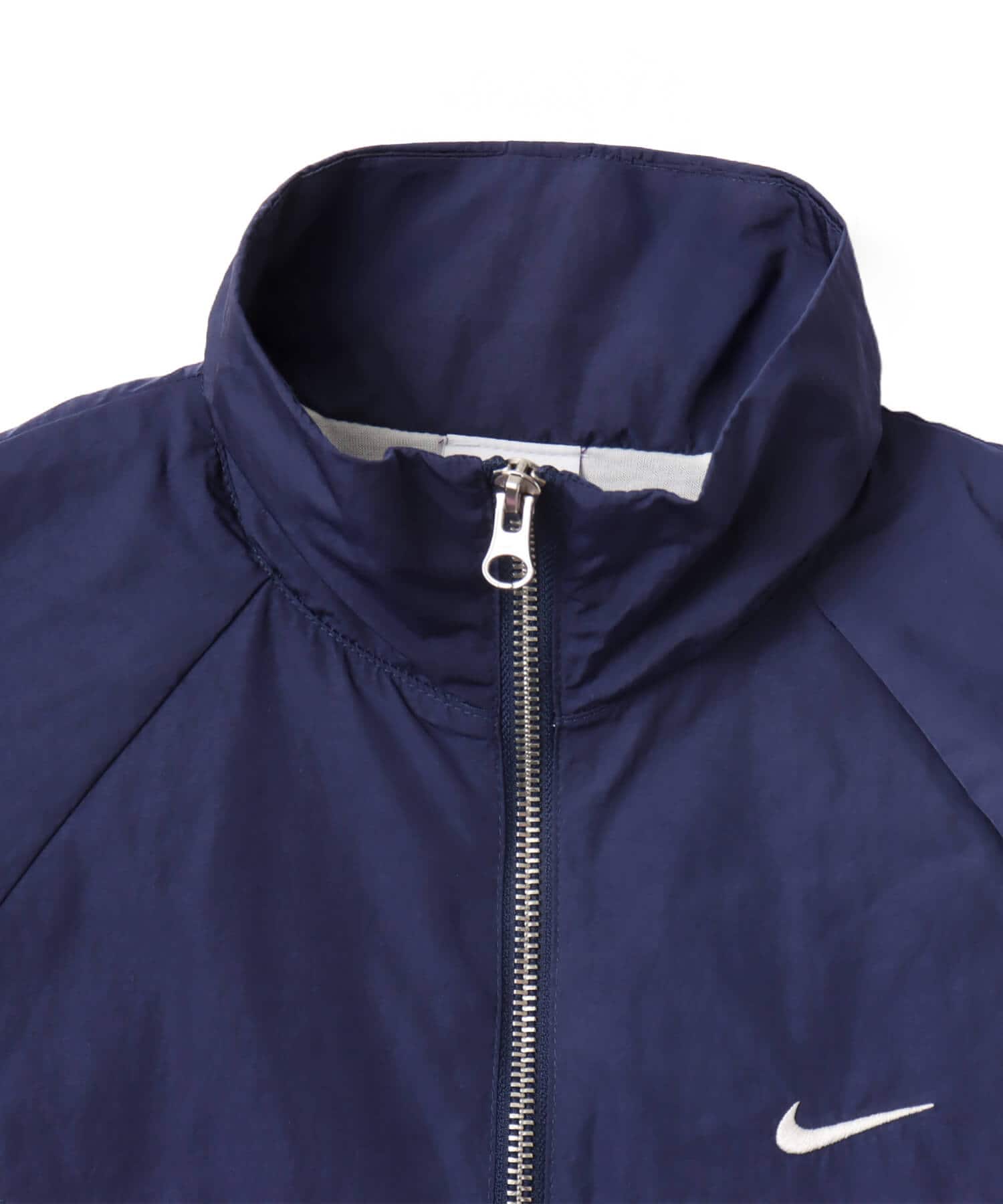 NIKE AS W NSW NK WR WVN UV FZ JKT MIDNIGHT NAVY/SAIL/PLAYFUL PINK/SAILの画像