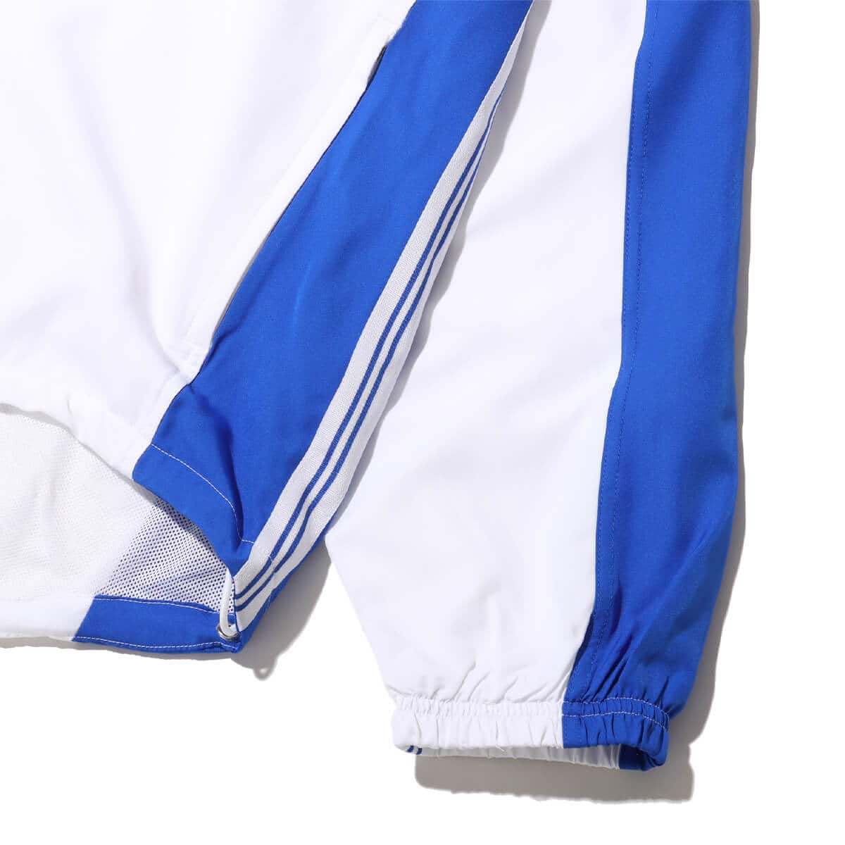 NIKE CBF M NK REISSUE TRK JKT WHITE/LYON BLUE/LYON BLUE の画像