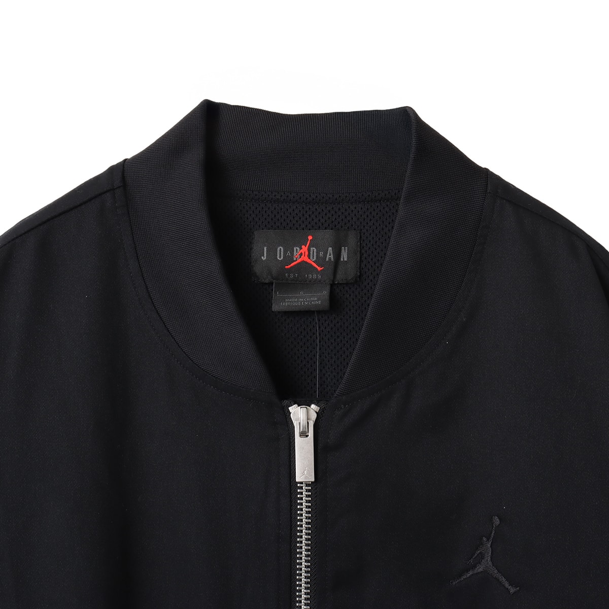 JORDAN BRAND M J ESS STMT LTWT RNGD JKT BLACKの画像