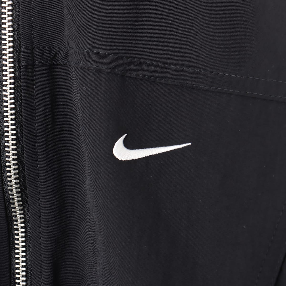 NIKE AS W NSW EVRTHNG WVN RPL UV BLACK/WHITEの画像
