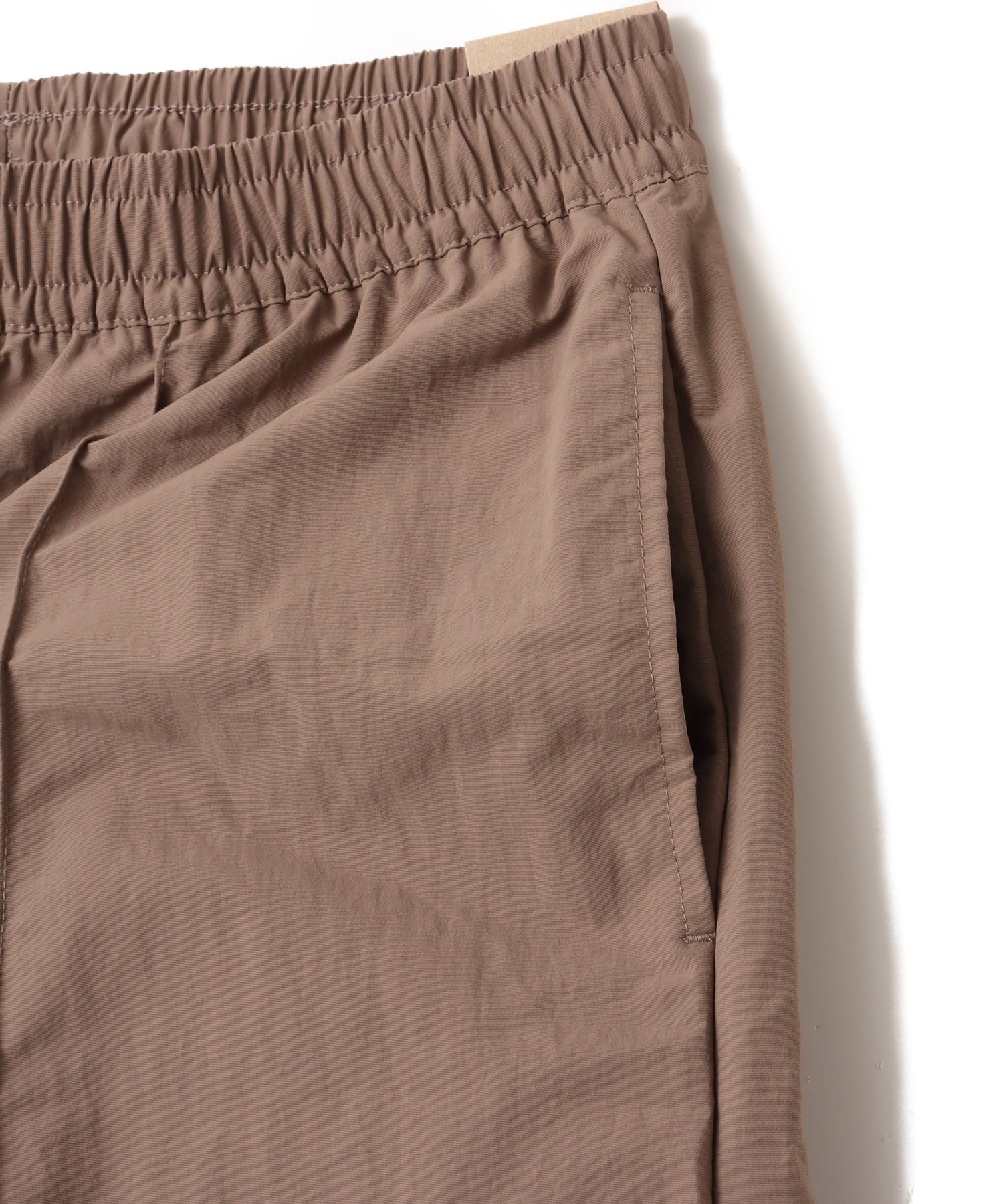 NIKE AS W NSW EVRYTHNG WVN HR 9" SH MINK BROWN/WHITEの画像