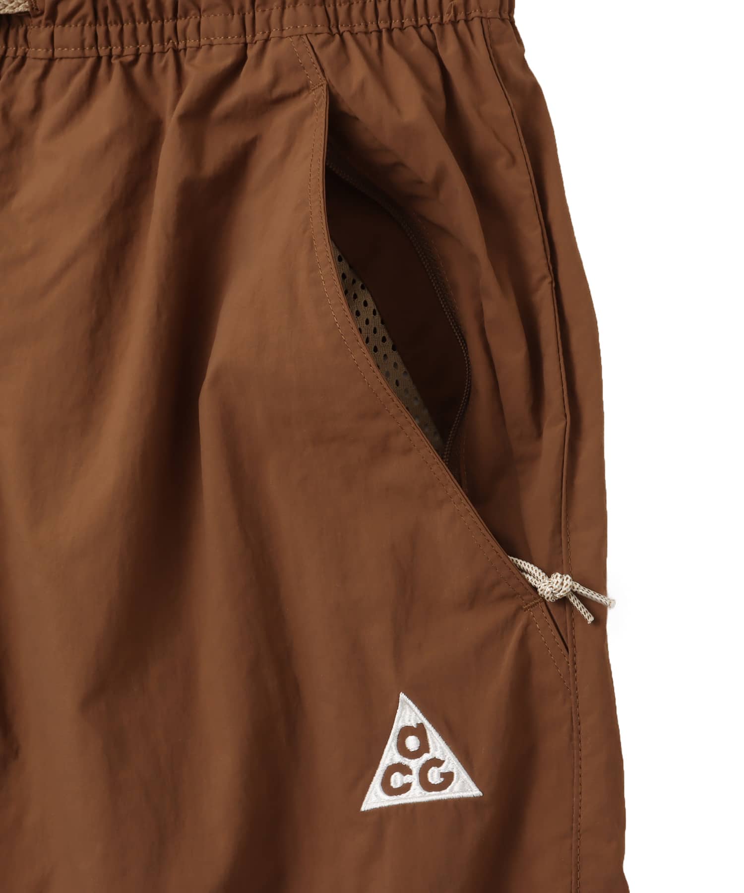 NIKE AS U ACG UV RPL ORB WVER OS SH MOSSWOOD BROWN/SUMMIT WHITEの画像