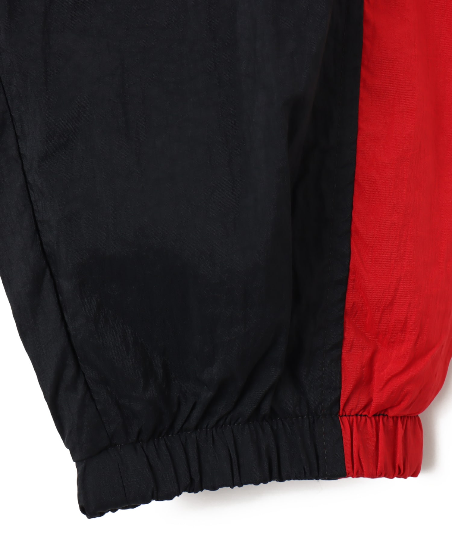 NIKE AS M NK RPL T90 TRK PANT W BLACK/GYM RED/SAILの画像