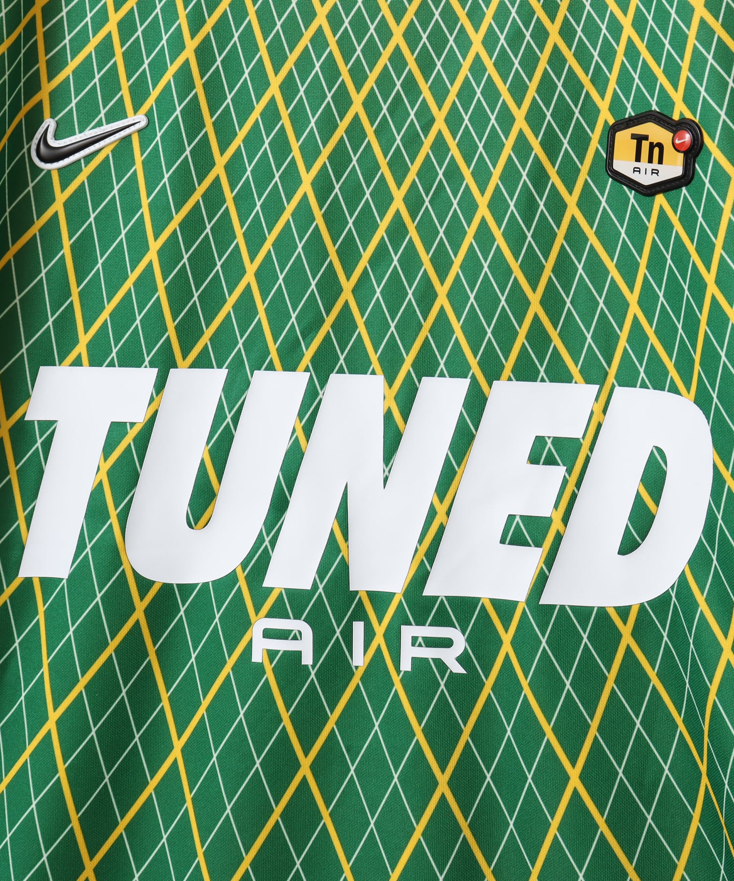 NIKE M NSW TN FB JERSEY VARSITY MAIZEの画像