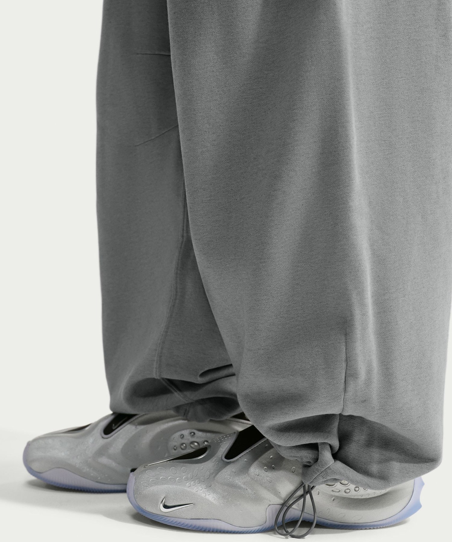 NIKE W NRG NK STUDIO FLEECE PANT COOL GREY HTRの画像