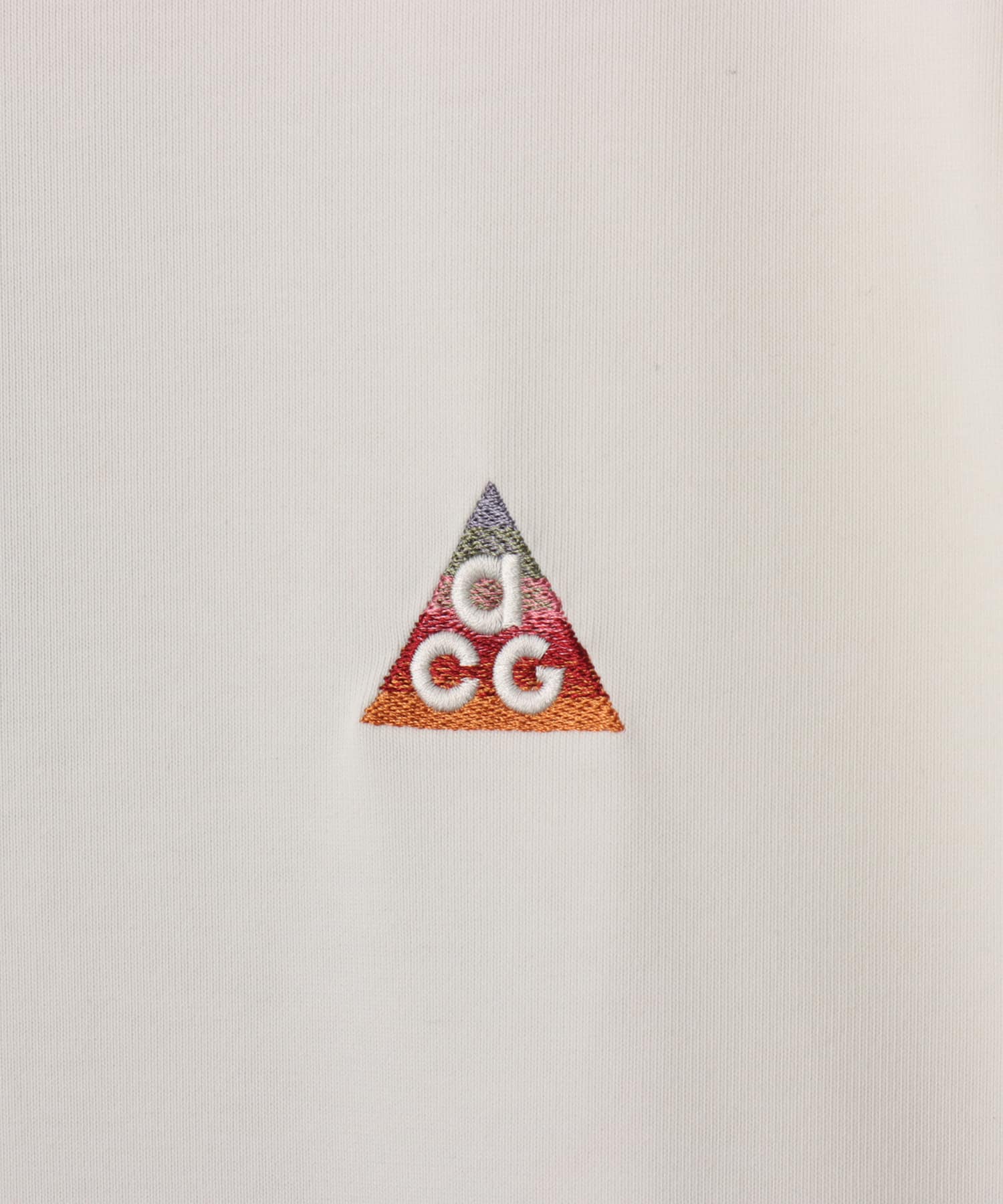 NIKE AS M NRG ACG DF CNY LS TEE IVORYの画像