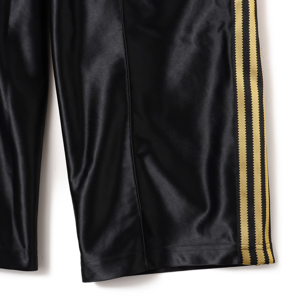 adidas SUPERSTAR TRACKPANTS ブラック/ゴールドメタリックの画像