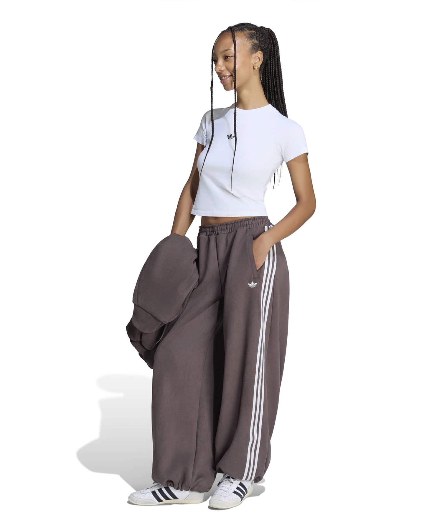 adidas ADILENIUM FAUX SUEDE TRACK PANT オーロラコーヒーの画像