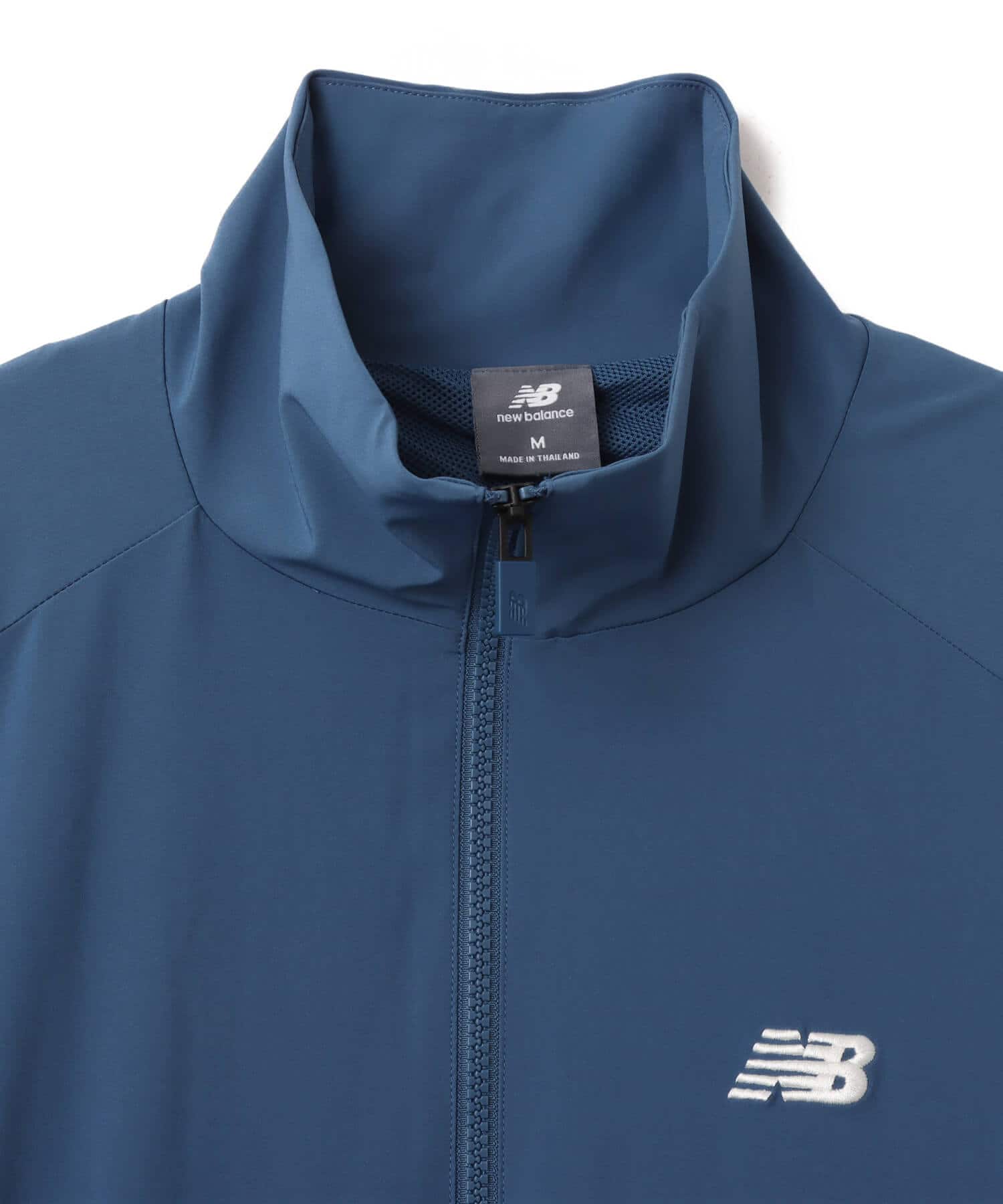 New Balance IN GAME WOVEN TRACK JACKET ダークショアラインブルーの画像