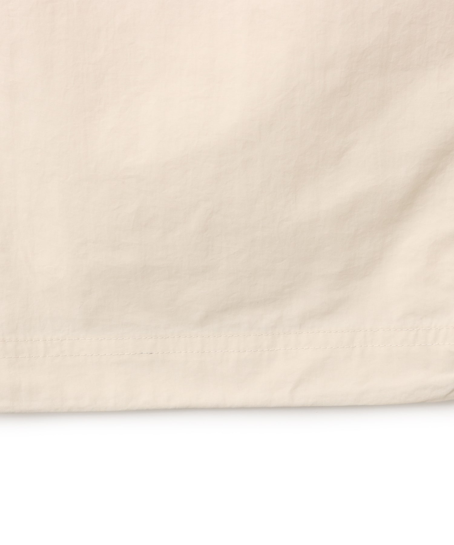 New Balance 大谷翔平 WOVEN NYLON PANTS ビスクの画像
