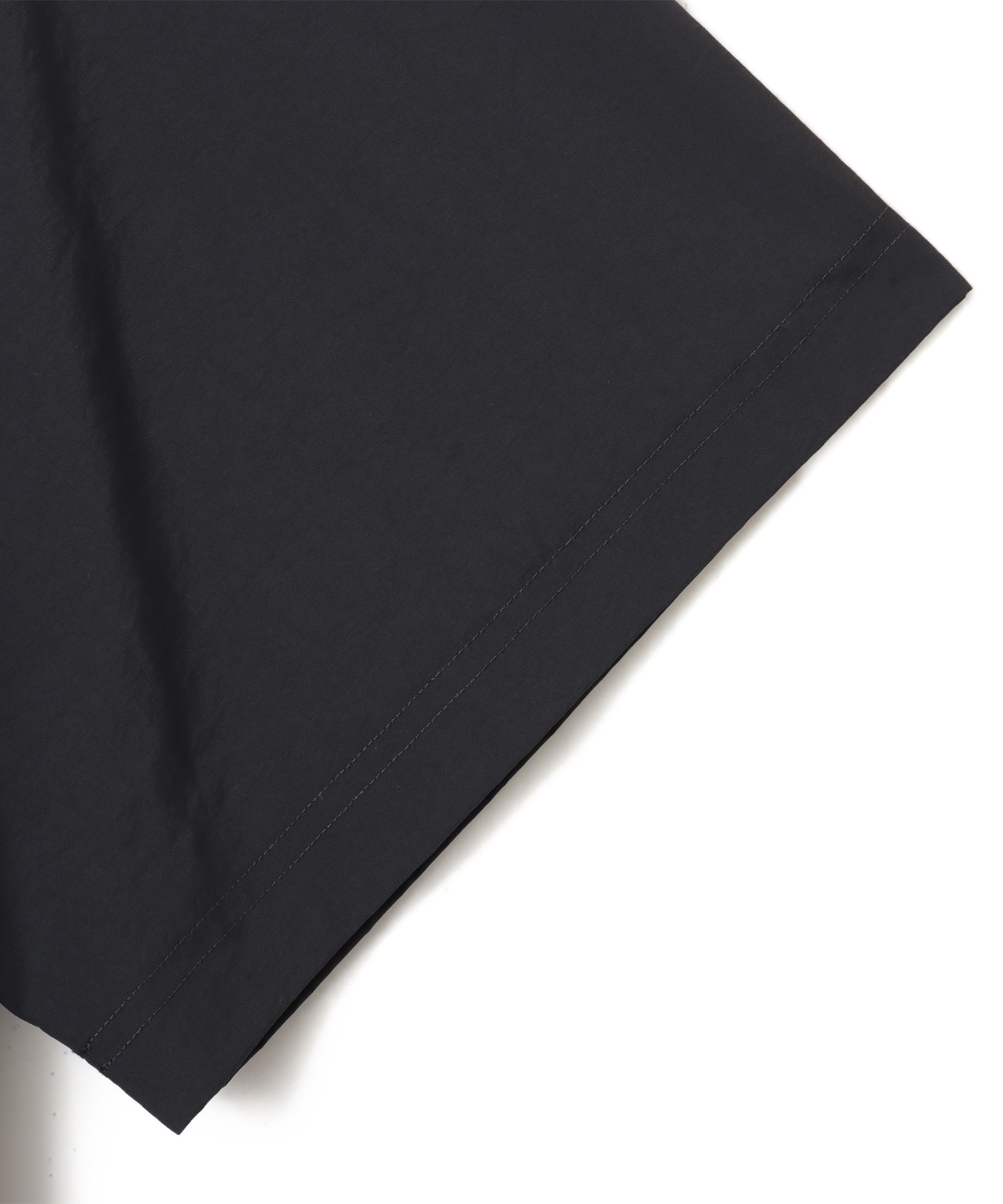 New Balance 大谷翔平 WOVEN SHORT SLEEVE TOP ファントムの画像