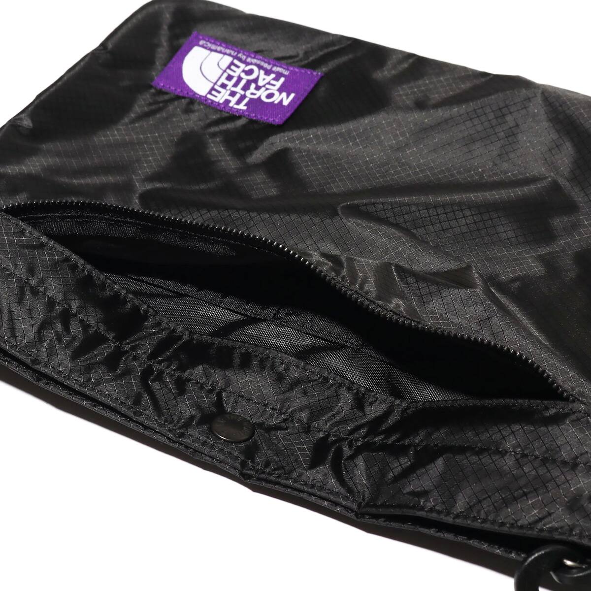 the north face purple label lightweight logo tape shoulder bag