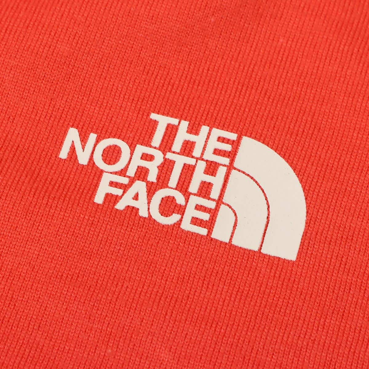 THE NORTH FACE BABY BIB レトロオレンジ 23SS-Iの画像