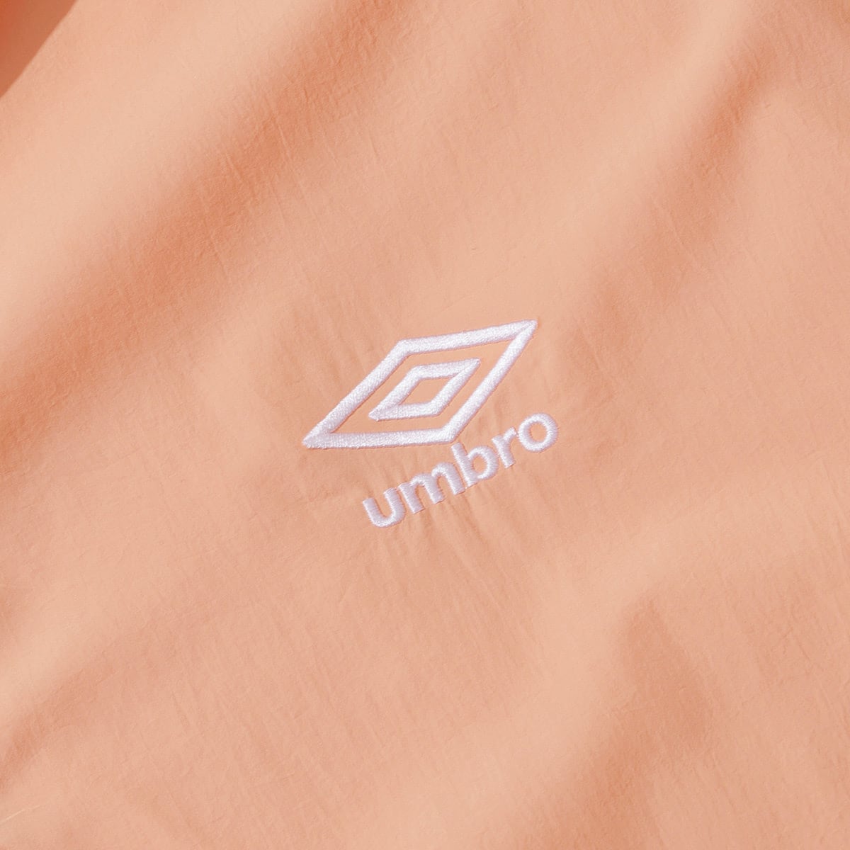 UMBRO SHORT SLEEVE HOODIE ANORAK ORANGE 23SU-Sの画像